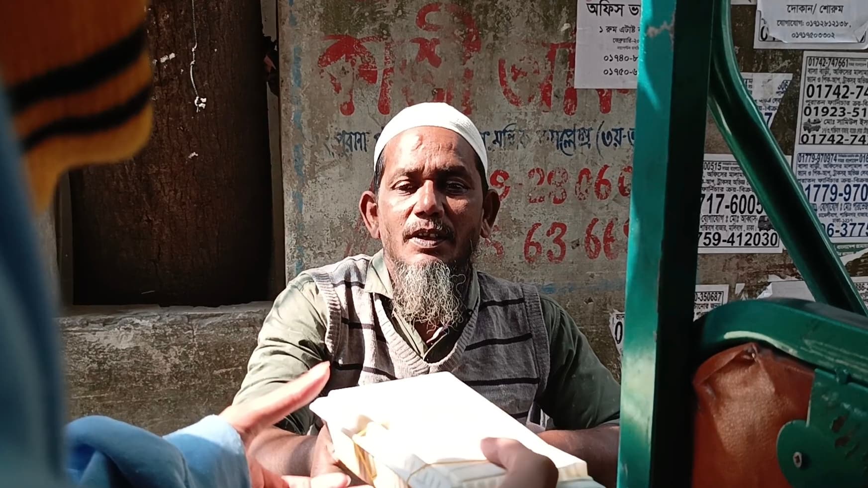 Chef preparing trays of meals for distribution